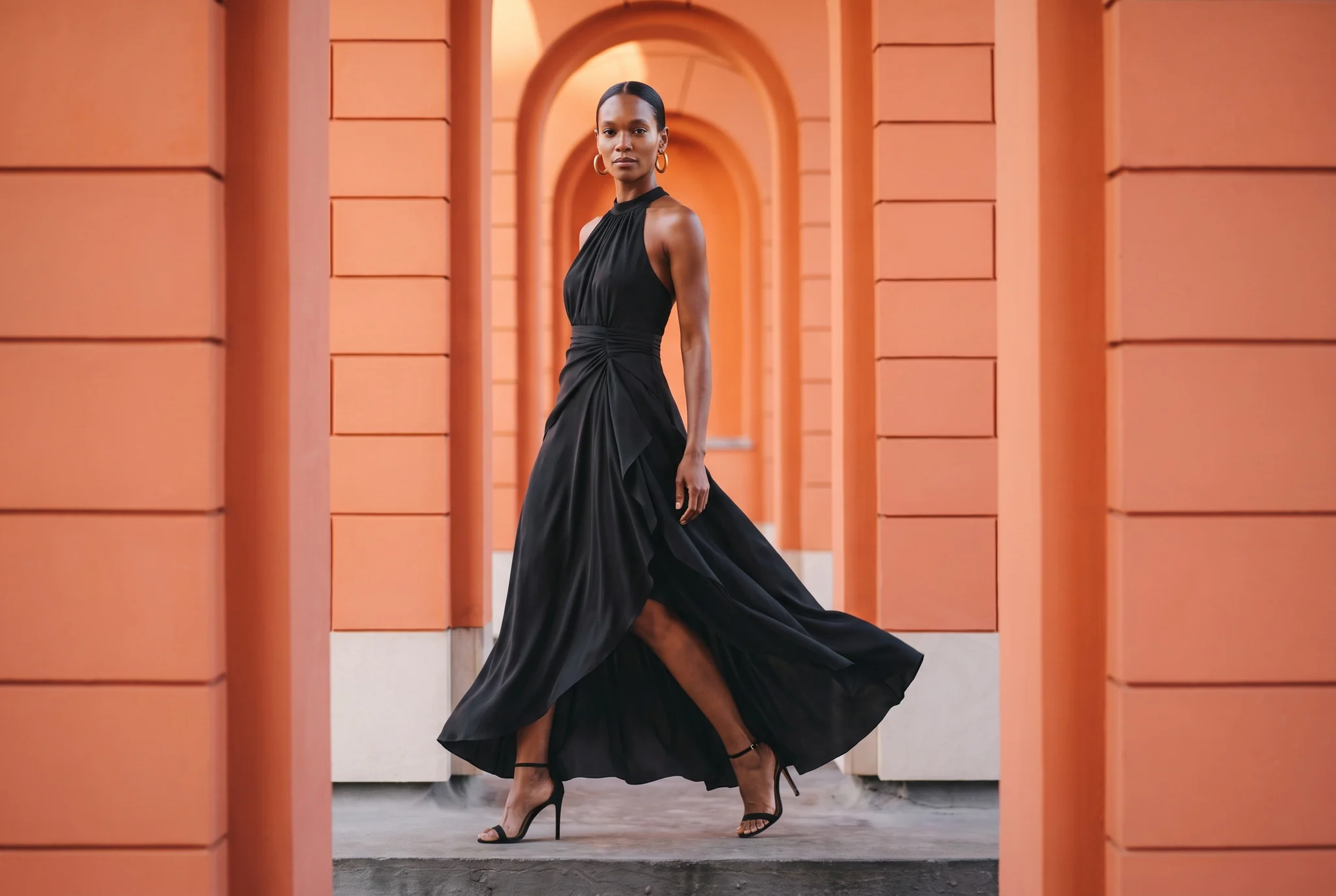 Portrait in the black halter maxi dress
